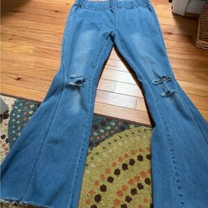 Classic Blue Flare Jeans with Distressed Details